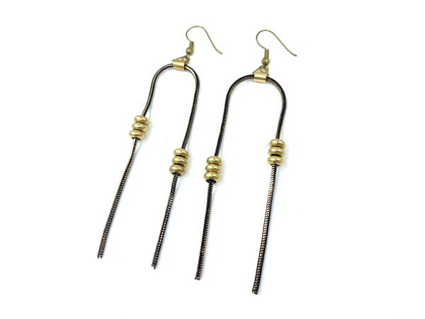 Gold beaded asymmetric earrings