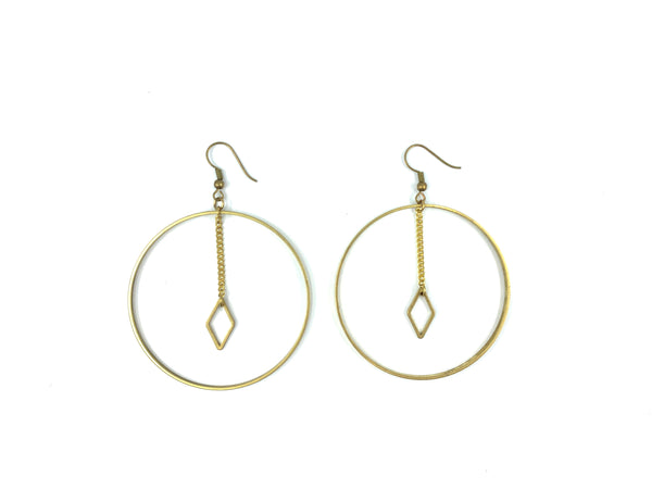 Big hoop earrings with diamond charm on a white background
