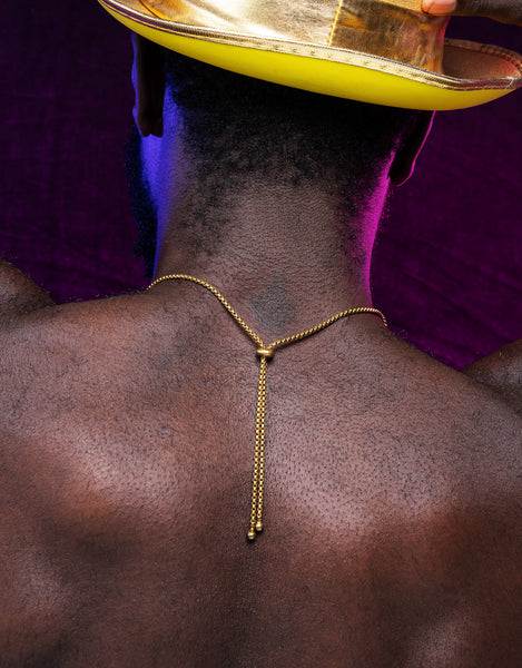 Back of model wearing slide bead choker