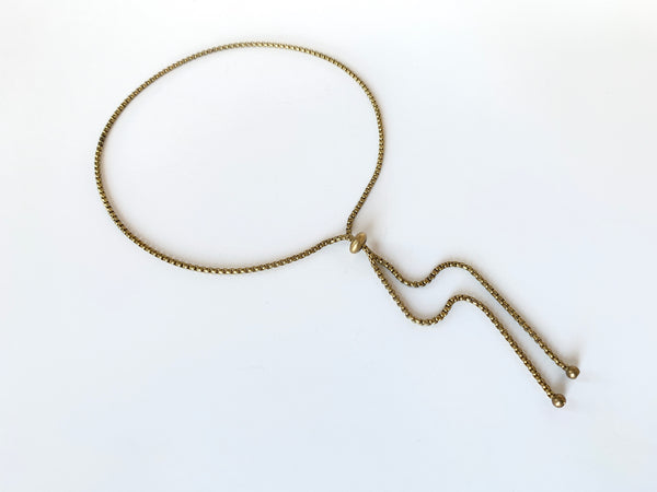Rolo chain bolo tie with slide bead and round gold bolo tips