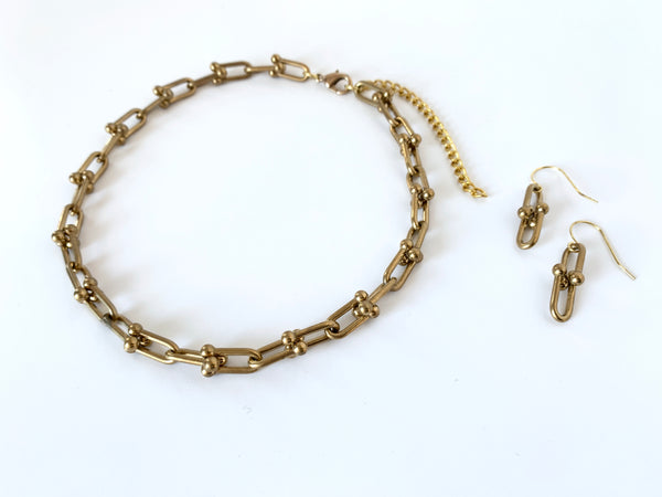 Matching jewelry set of hardware chain choker and earrings