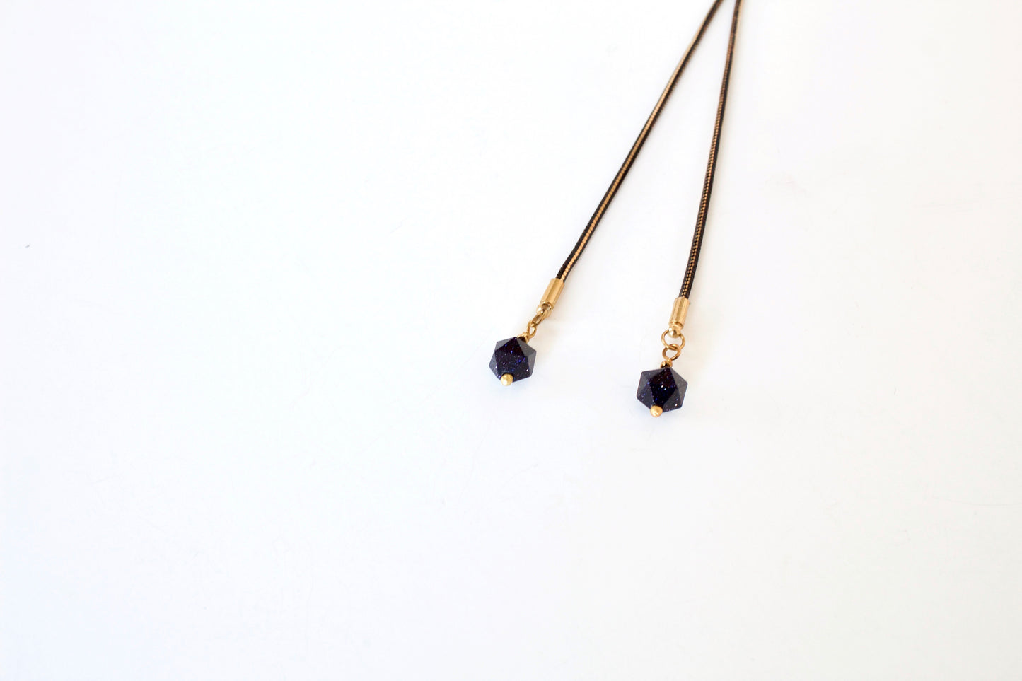 Blue goldstone bolo tie tips