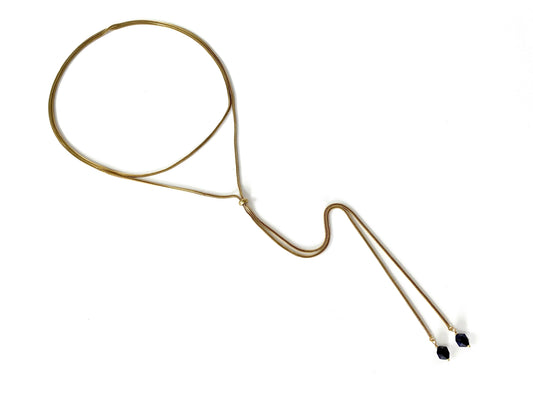 Top view of gold wrap necklace