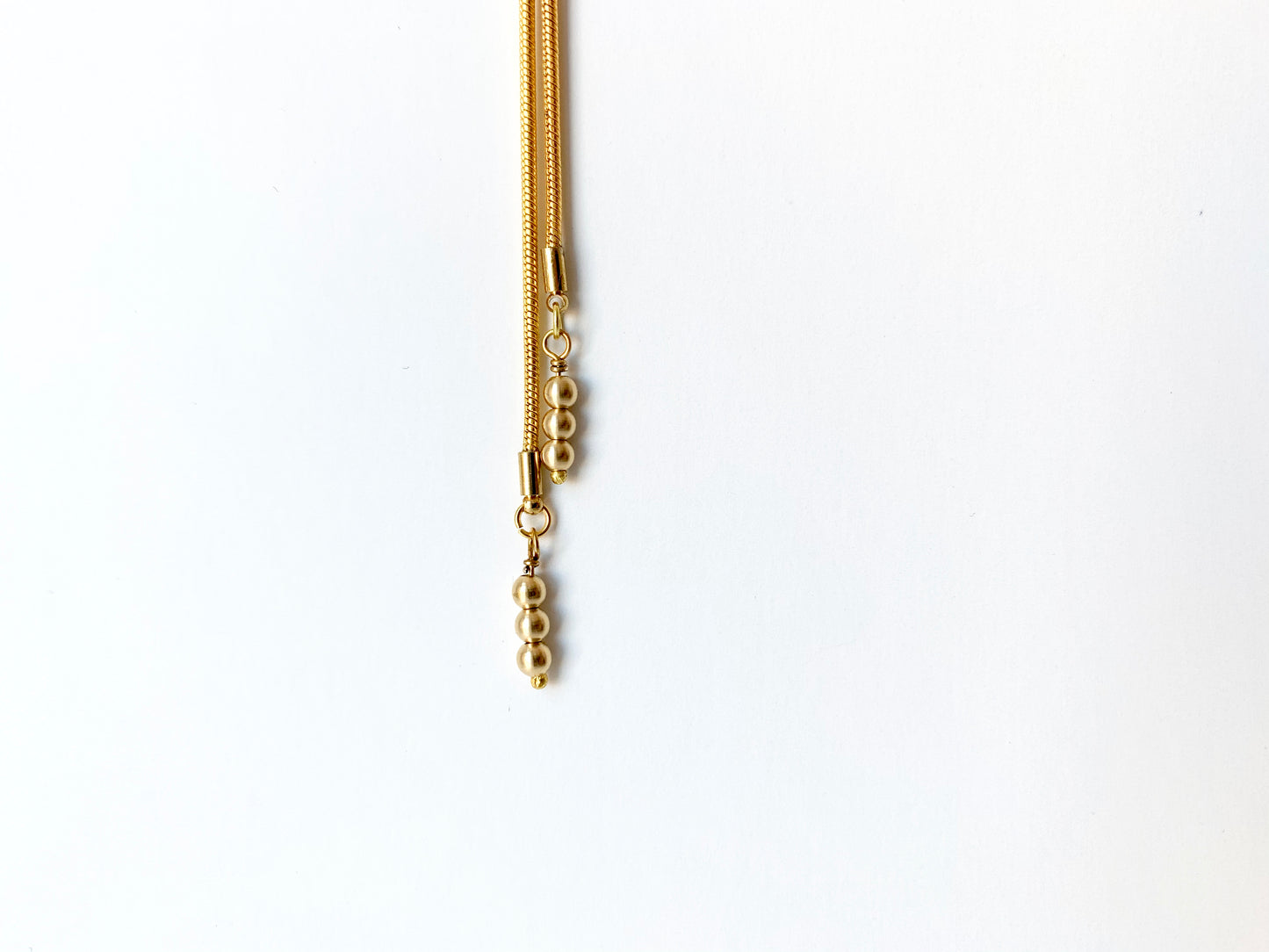 Gold bolo tie tips
