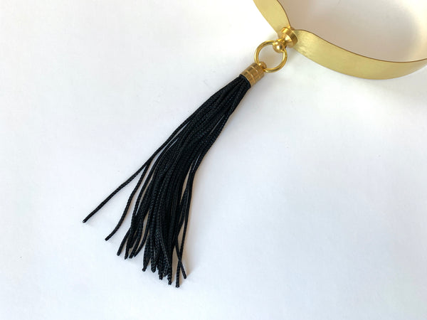 Close up of black chainette tassel of choker collar