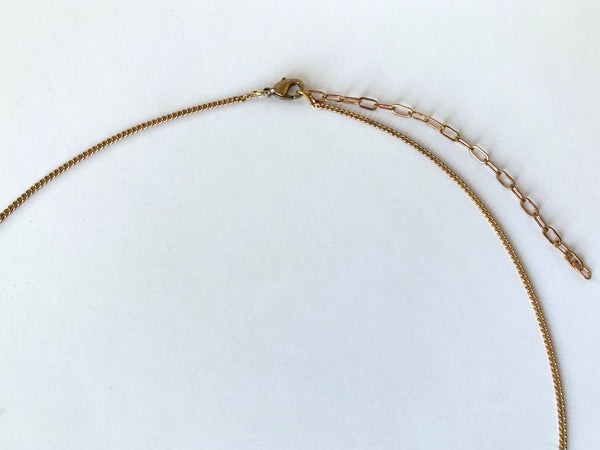 Lobster clasp and extender chain of gold choker