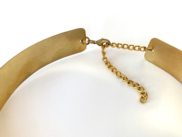 Inside of gold choker with clasp and extender chain