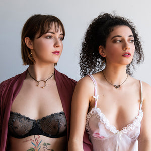 Models wearing Lord Violet chokers and lingerie