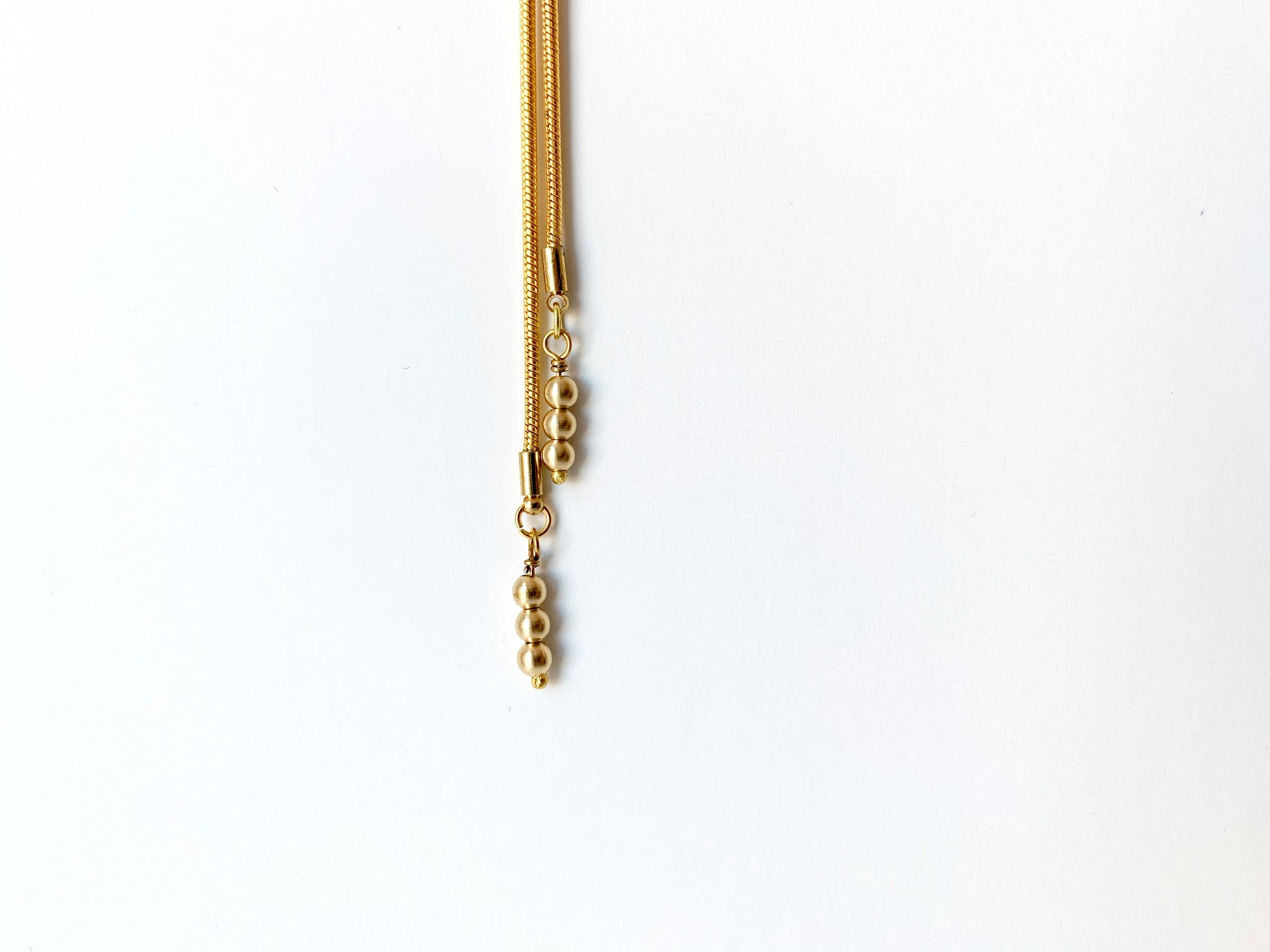 Gold bolo tie tips