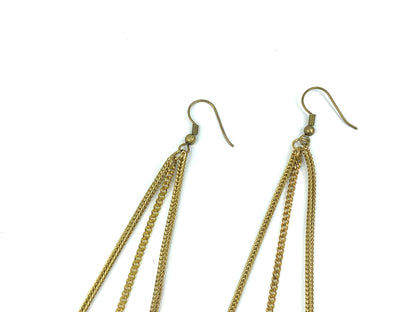 Close up of earring hooks and chain of drop earrings