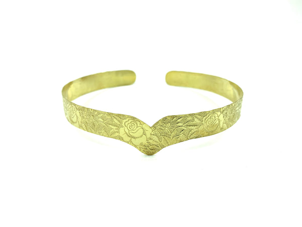 Gold flower cuff choker on a white background