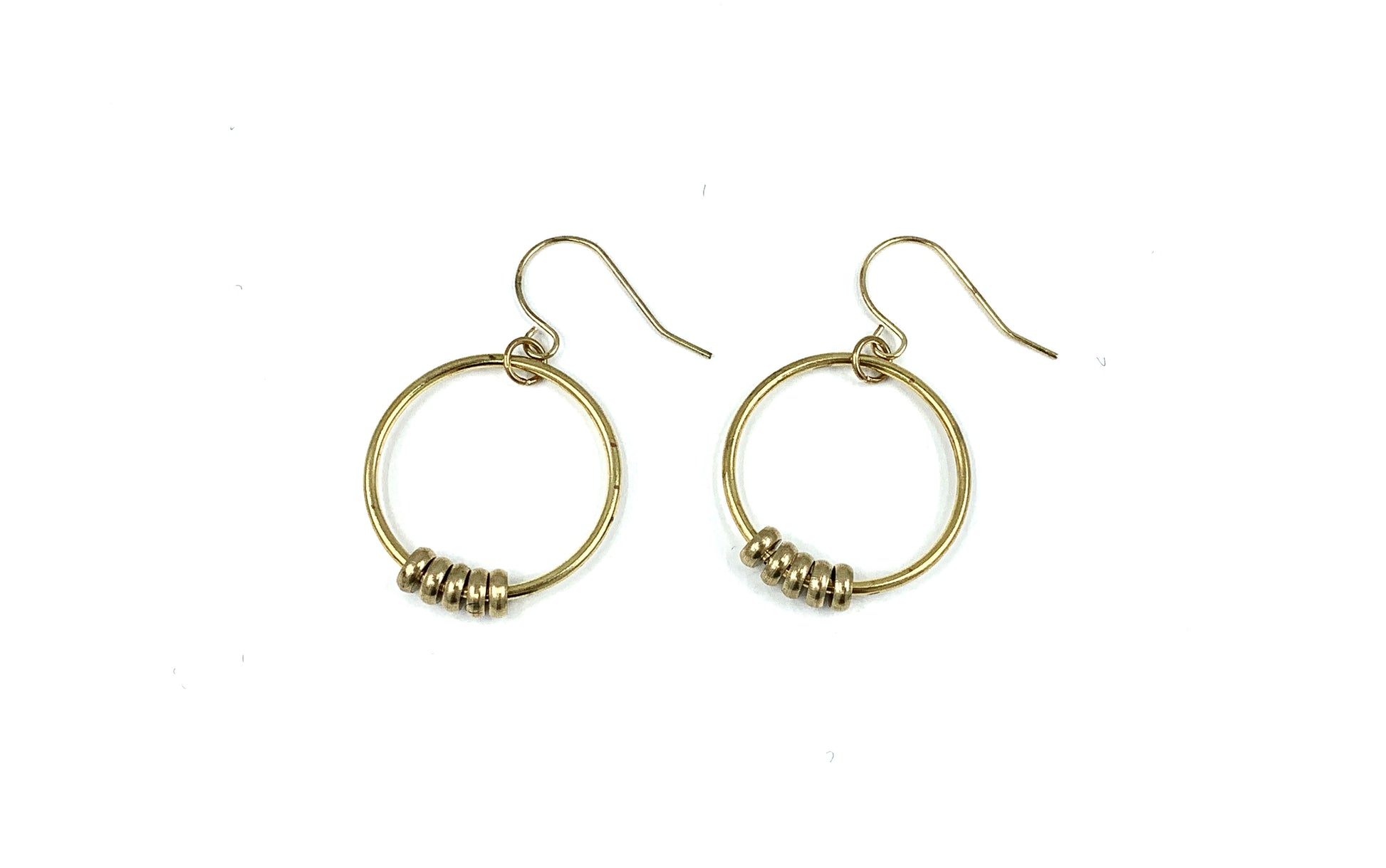 Beaded hoop earrings on a white background