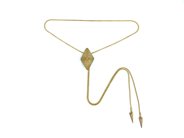 Gold diamond bolo tie with gold snake chain and gold spike bolo tips on a white background