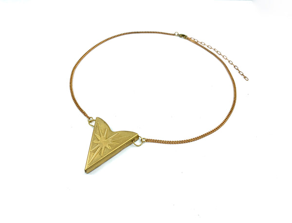 Star choker necklace on a white background