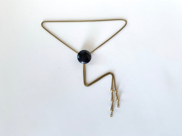 Bolo tie with blue goldstone pendant, brass rolo chain and brass bead tips