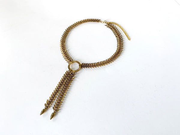 Gold fishbone choker necklace with spike tassels