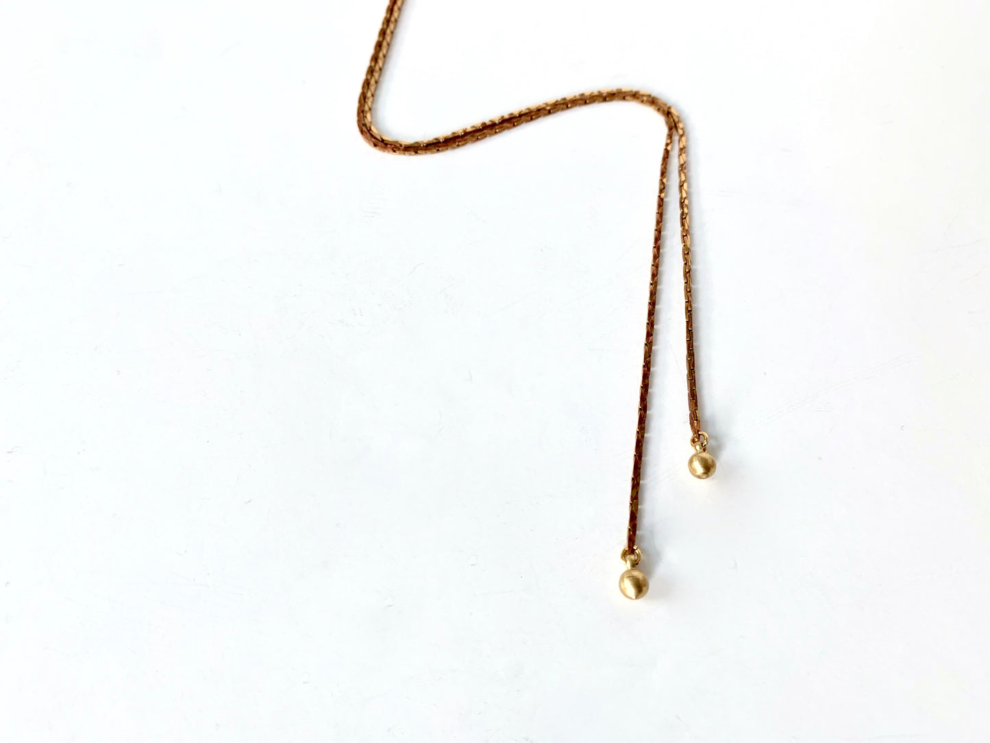 Square brass snake chain with round brass bolo tie tips