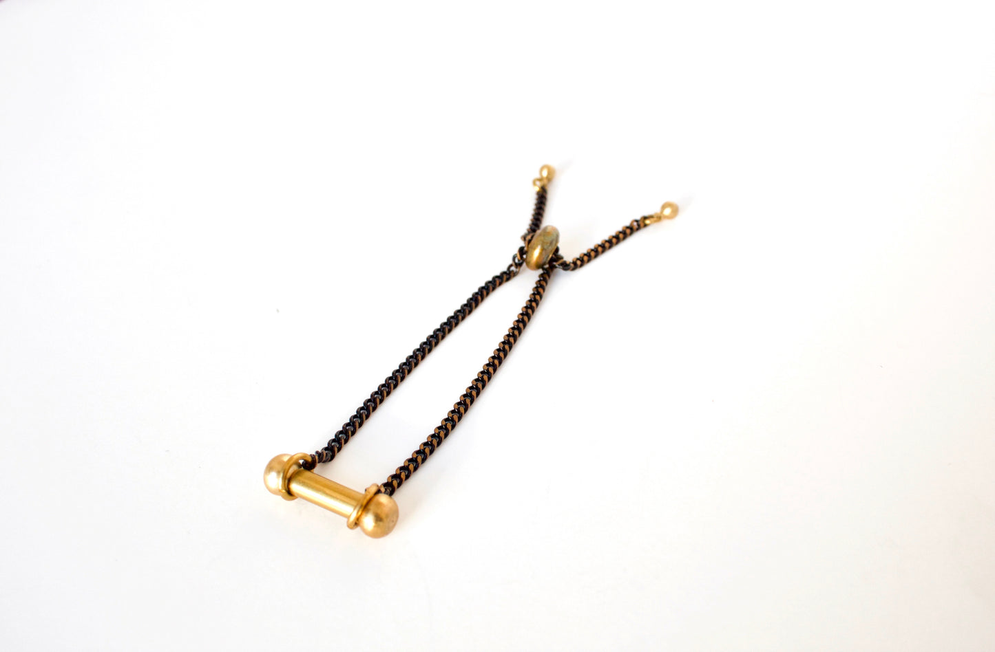 Adjustable black and gold bracelet