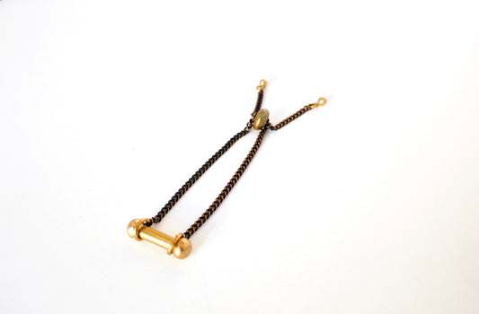 Adjustable black and gold bracelet