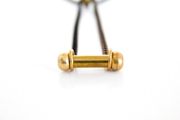 Front view of gold barbell bracelet 