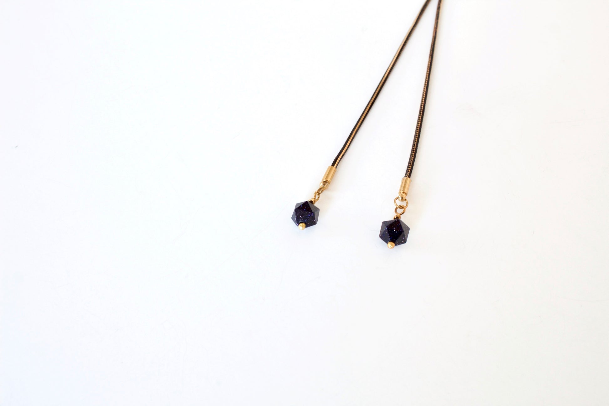 Blue goldstone bolo tie tips