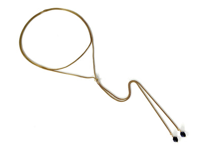 Top view of gold wrap necklace