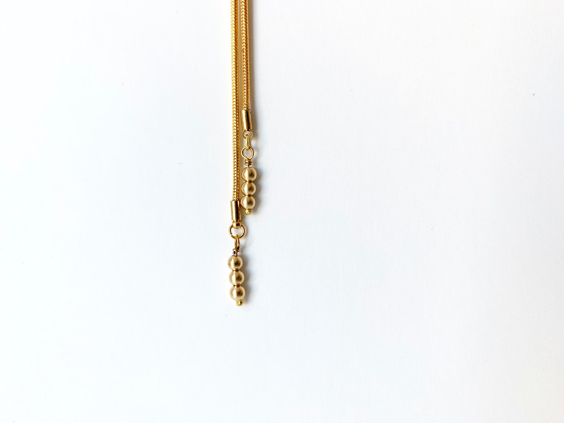 Gold bolo tie tips