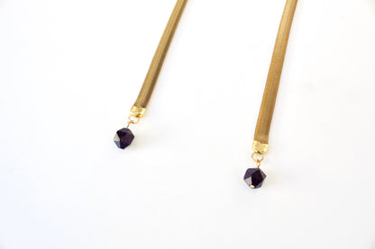 Faceted blue goldstone tips of wrap necklace