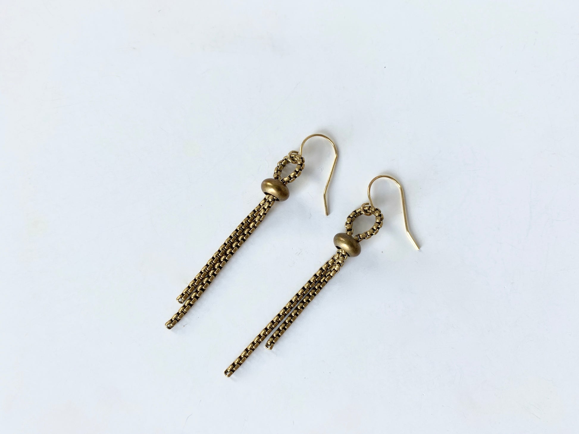 Lasso style earrings with rolo chain and slide bead