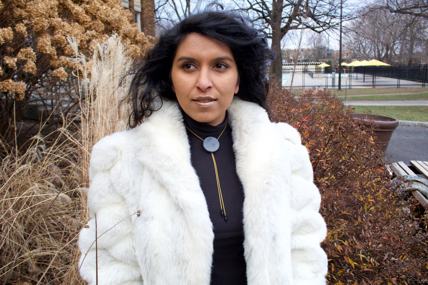 Grey concrete bolo tie on a model