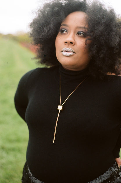 DEMURE Cube Bolo