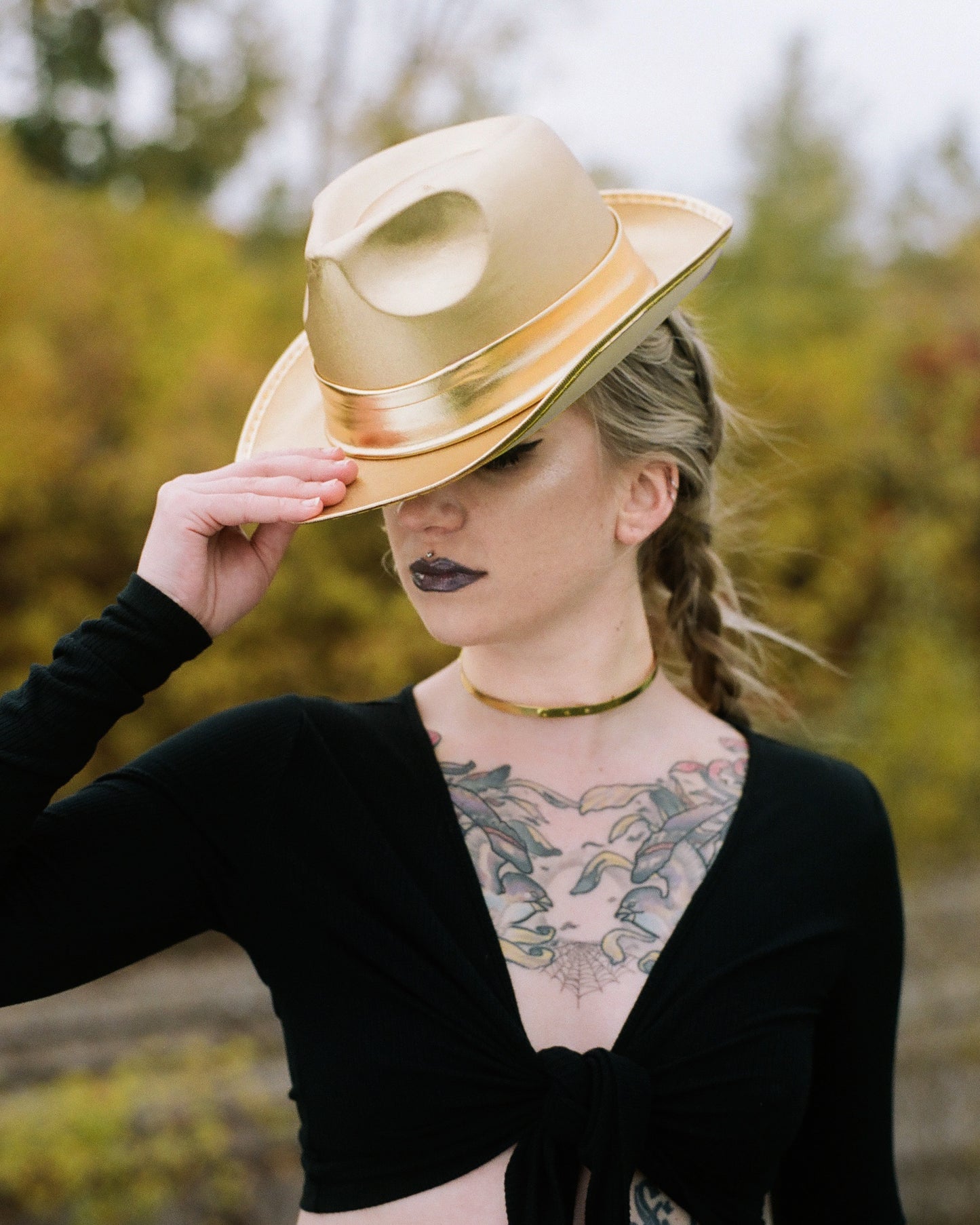 Back view of gold choker on a model