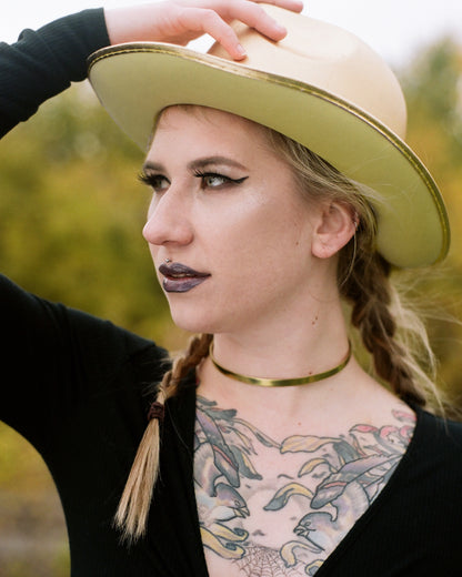 Day collar on a model wearing a cowboy hat